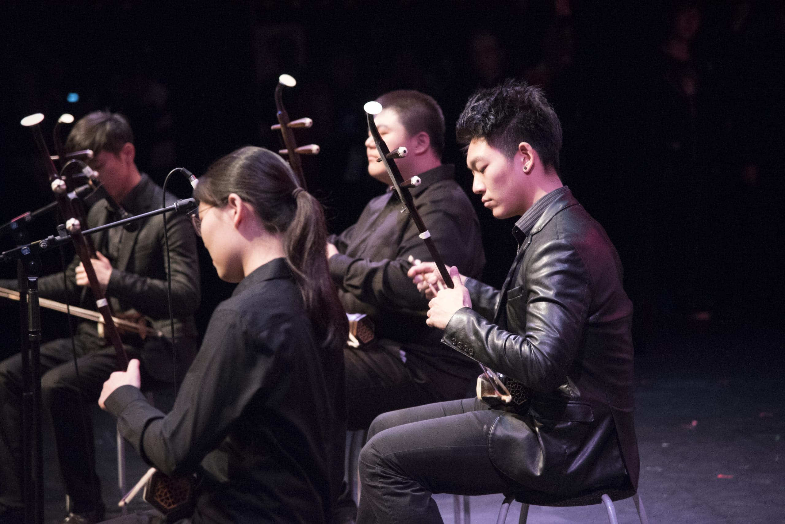 YCMA erhu musicians performing together on stage